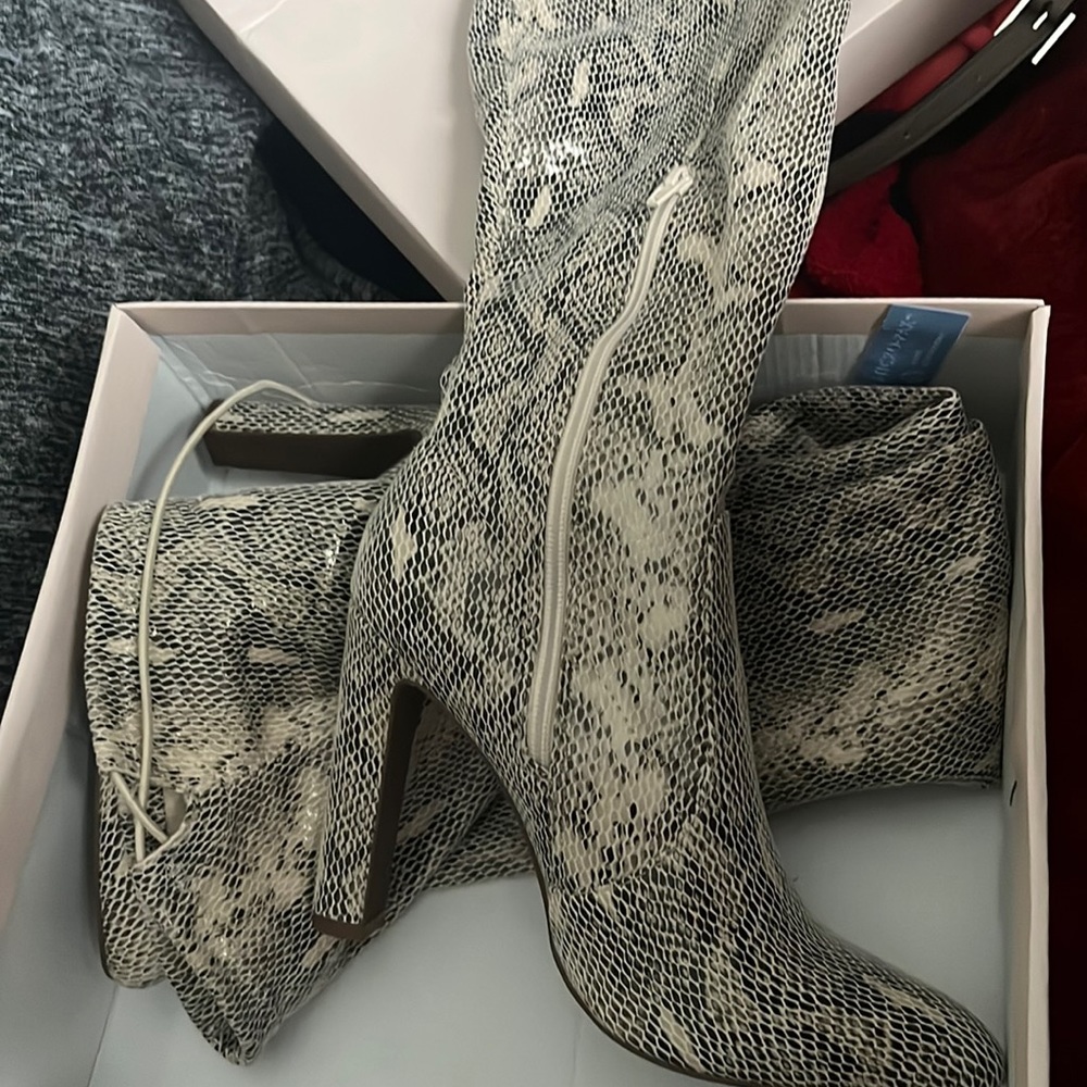 Gently used black size 8 thigh high boots